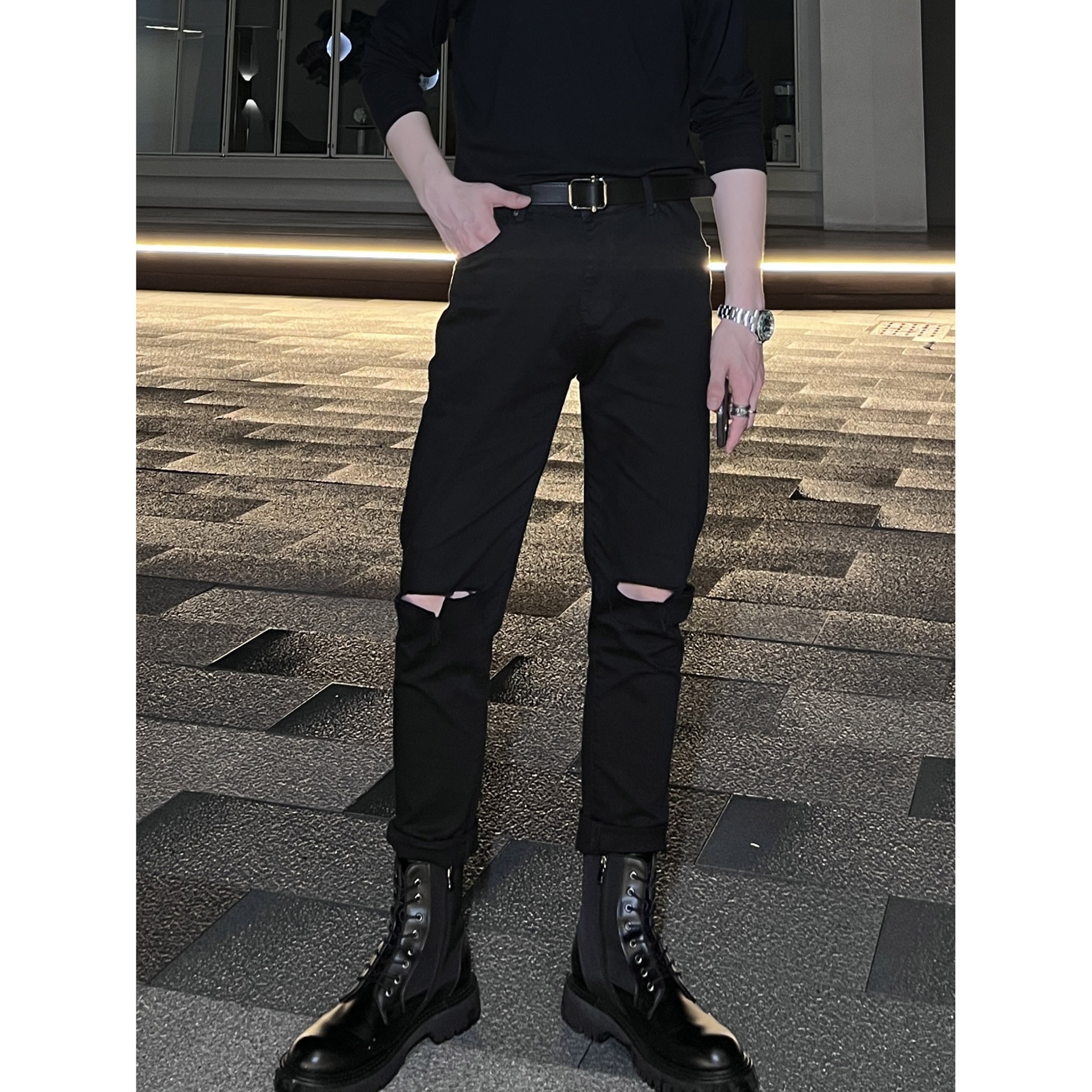 Черные джинсы с прорезями на коленях оптом из Китая