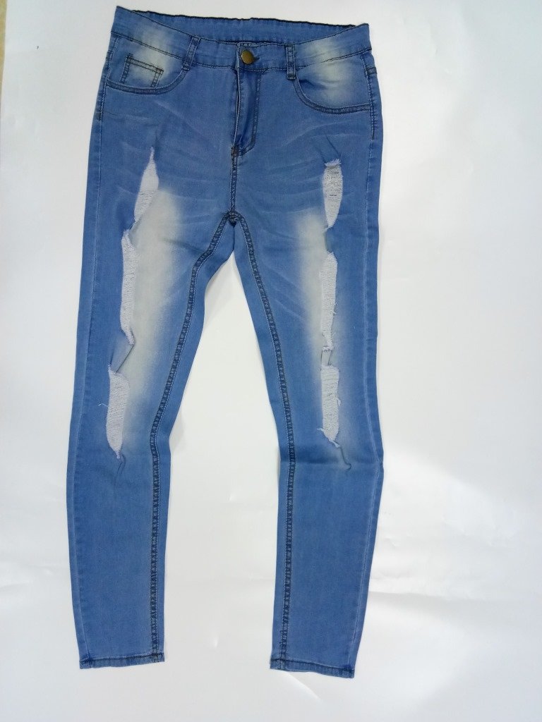 Мужские джинсы с разрывами и зауженными штанинами оптом из Китая