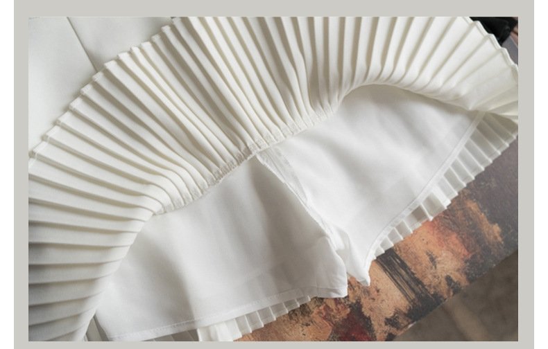 Шелковая короткая юбка с плиссированным низом оптом из Китая