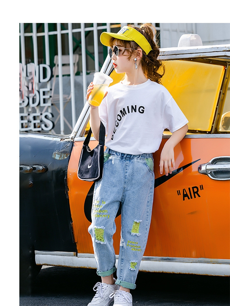 Летние джинсы для девочек с вышивкой и дырками оптом из Китая