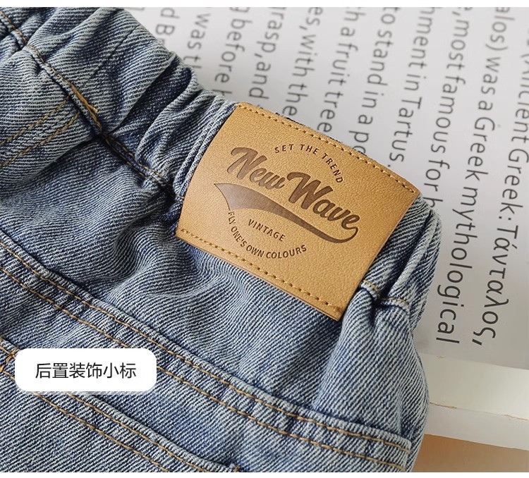 Джинсы для мальчиков с прорезями весенней моды оптом из Китая