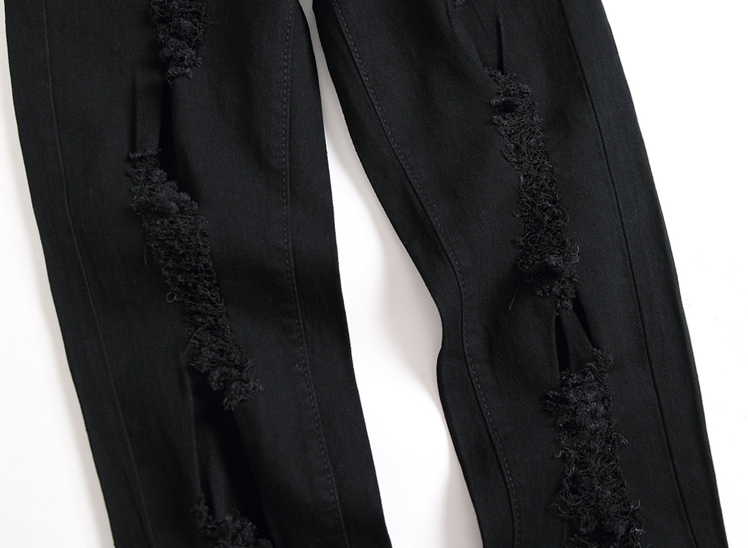 Мужские джинсы с разрывами и зауженными штанинами оптом из Китая