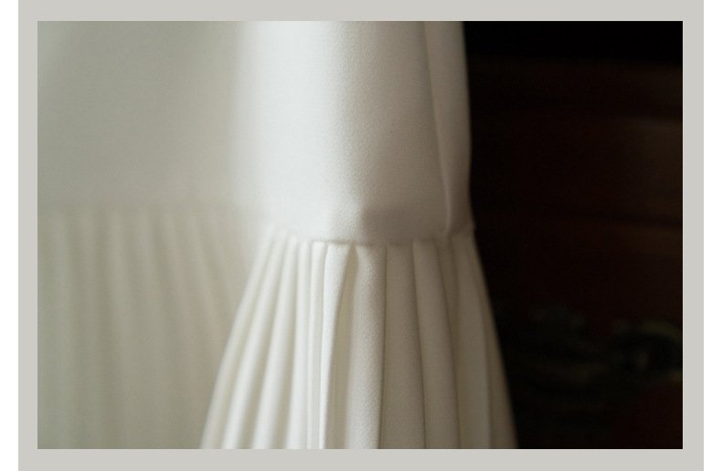 Шелковая короткая юбка с плиссированным низом оптом из Китая