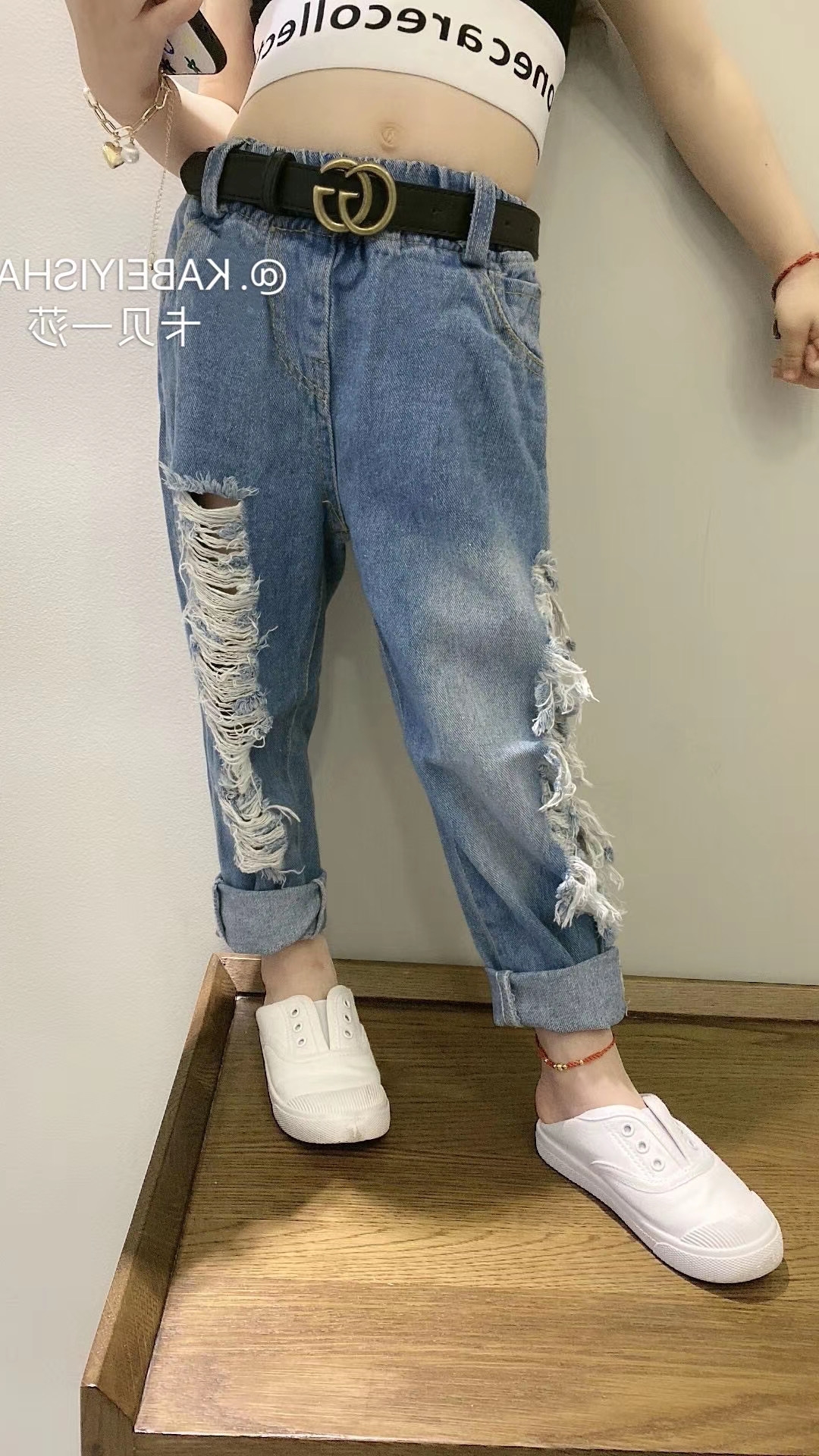 Детские джинсы с разрезами по бокам оптом из Китая