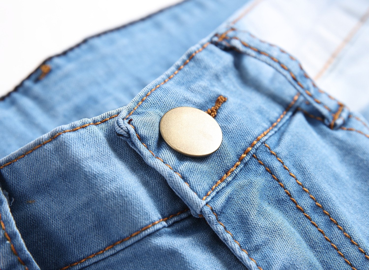 Мужские джинсы с разрывами и зауженными штанинами оптом из Китая