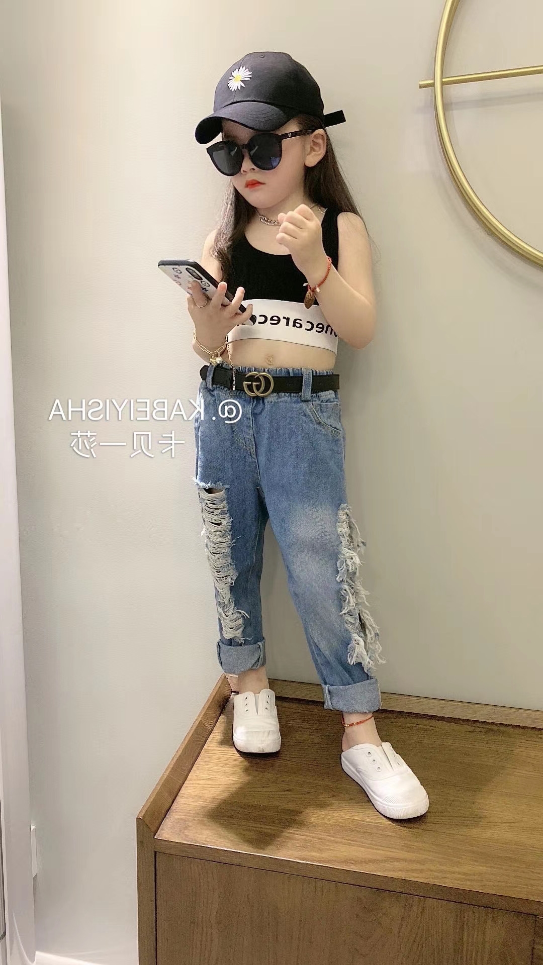 Детские джинсы с разрезами по бокам оптом из Китая