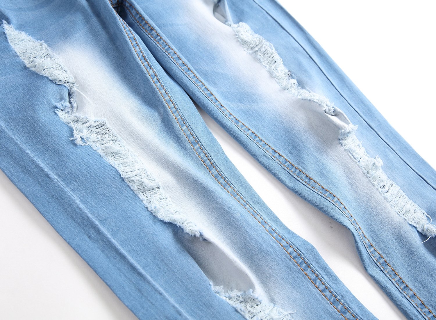 Мужские джинсы с разрывами и зауженными штанинами оптом из Китая