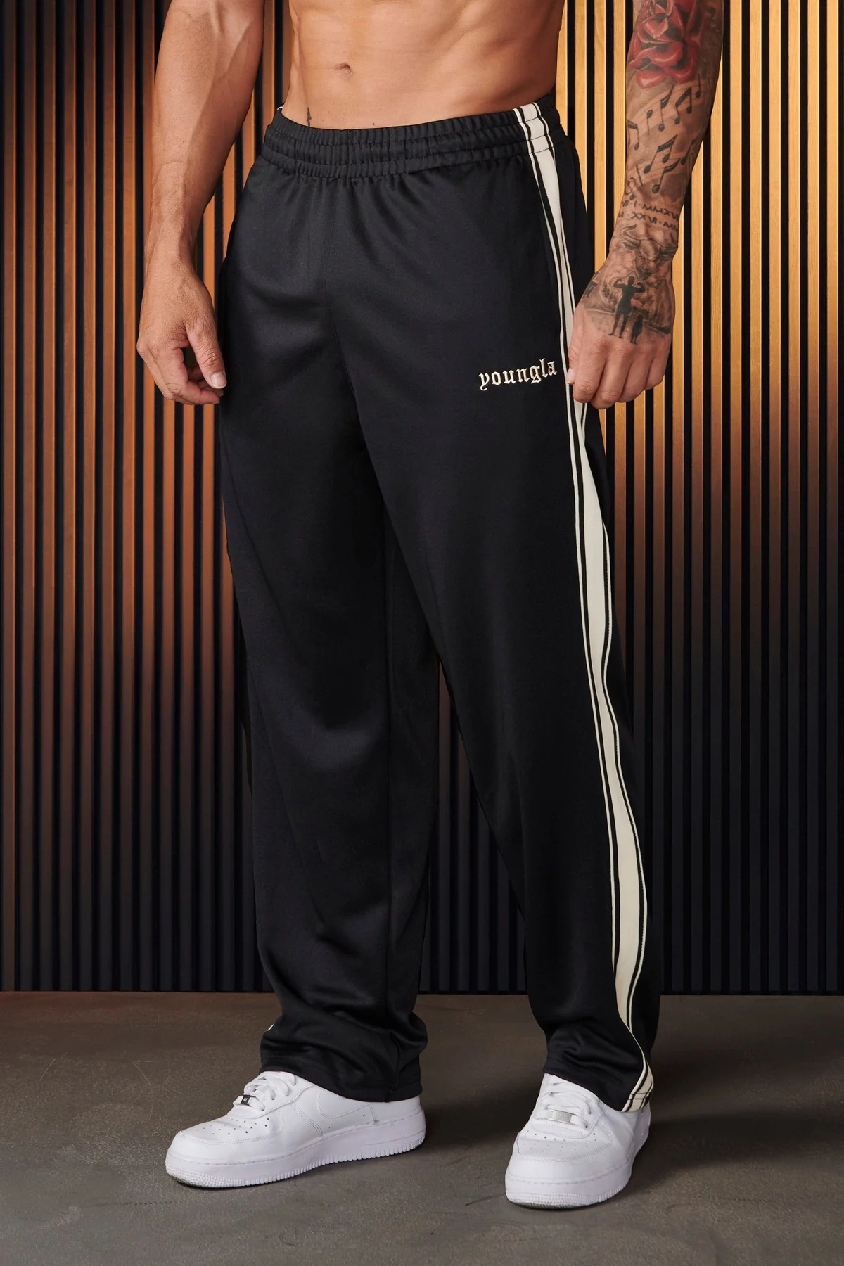 Повседневные мужские брюки с полосками и вышивкой оптом из Китая