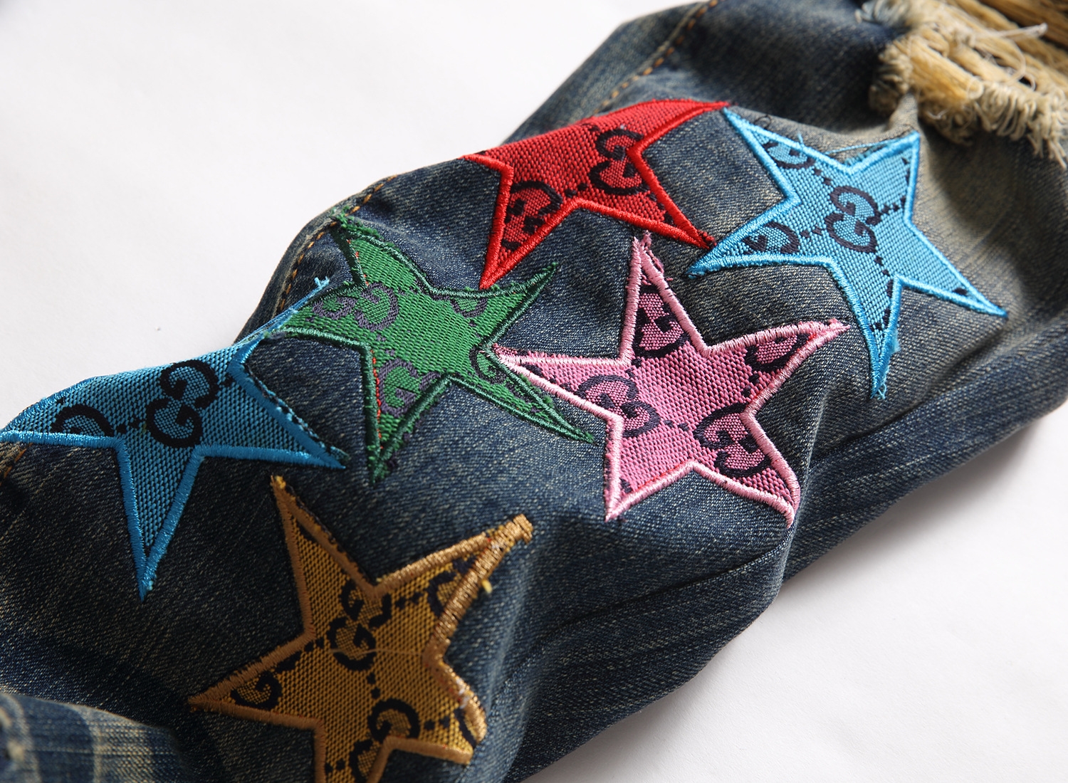 Мужские джинсы с вышивкой и принтом оптом из Китая