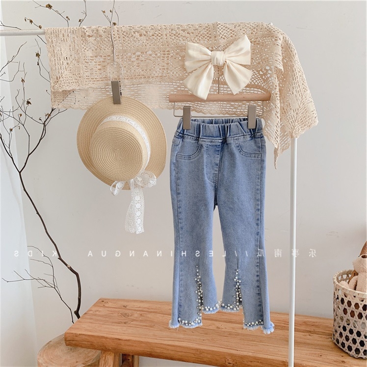 Детские джинсы с жемчугом и кружевами оптом из Китая