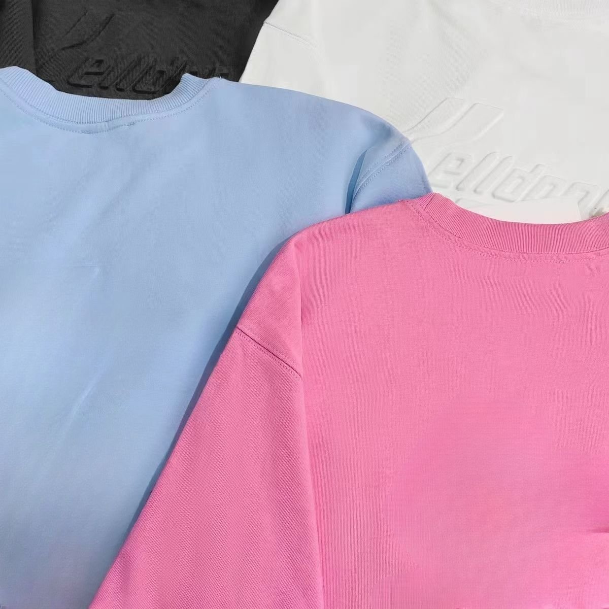 Летняя футболка с высоким уровнем деталей WE11DONE оптом