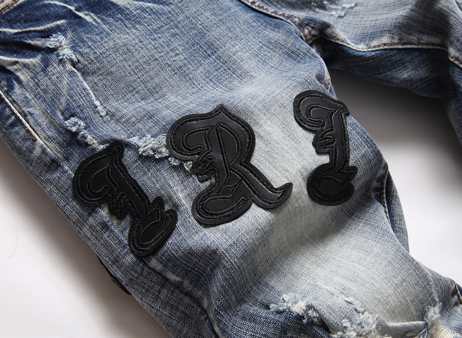 Мужские джинсы с вышивкой и принтом оптом из Китая