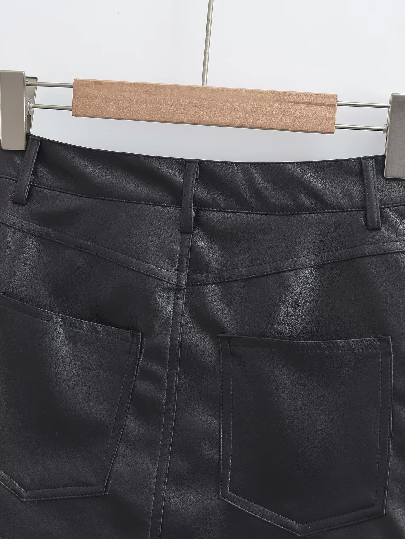 Женская юбка из PU-кожи 2023 нового дизайна высокой посадки оптом из Китая