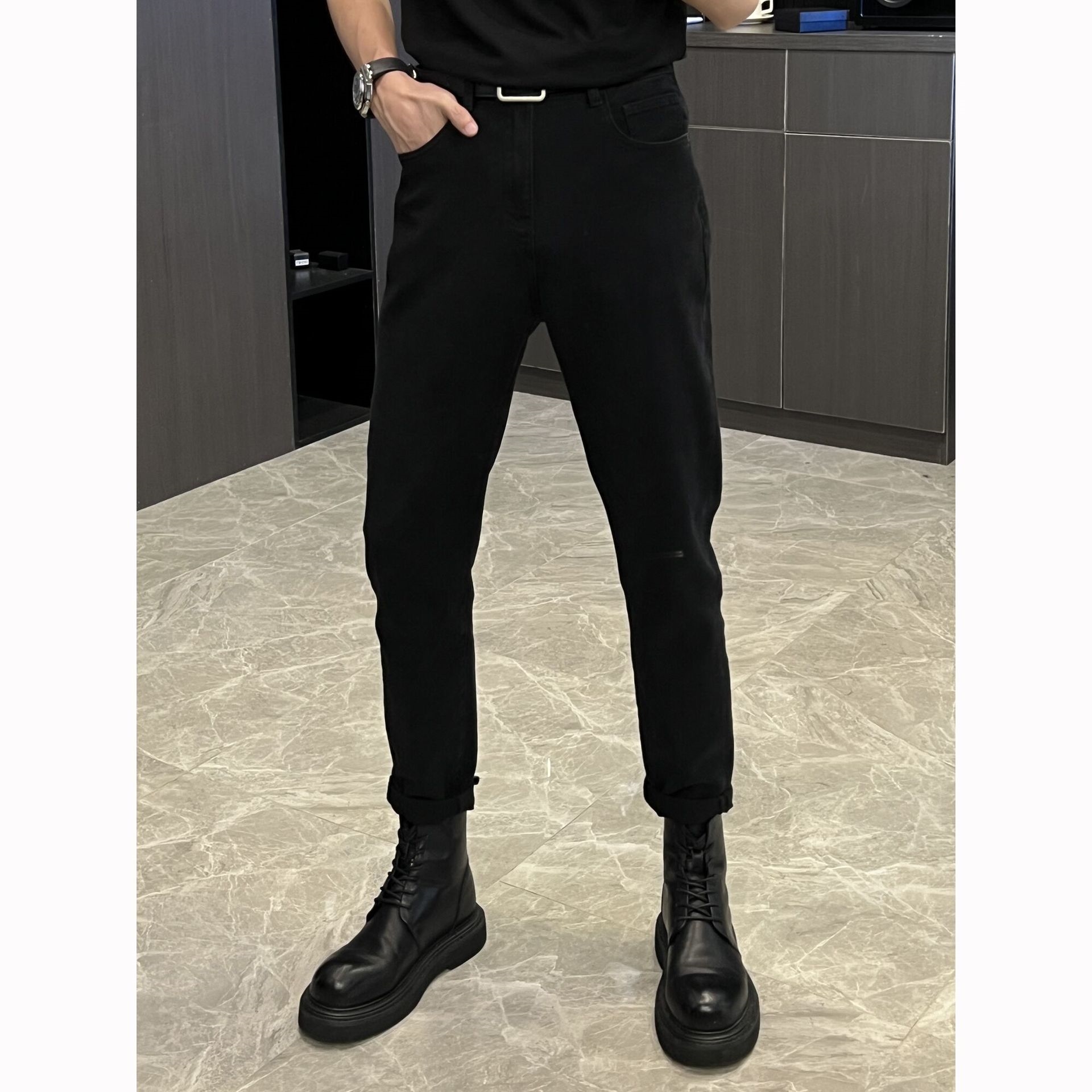 Черные джинсы с прорезями на коленях оптом из Китая