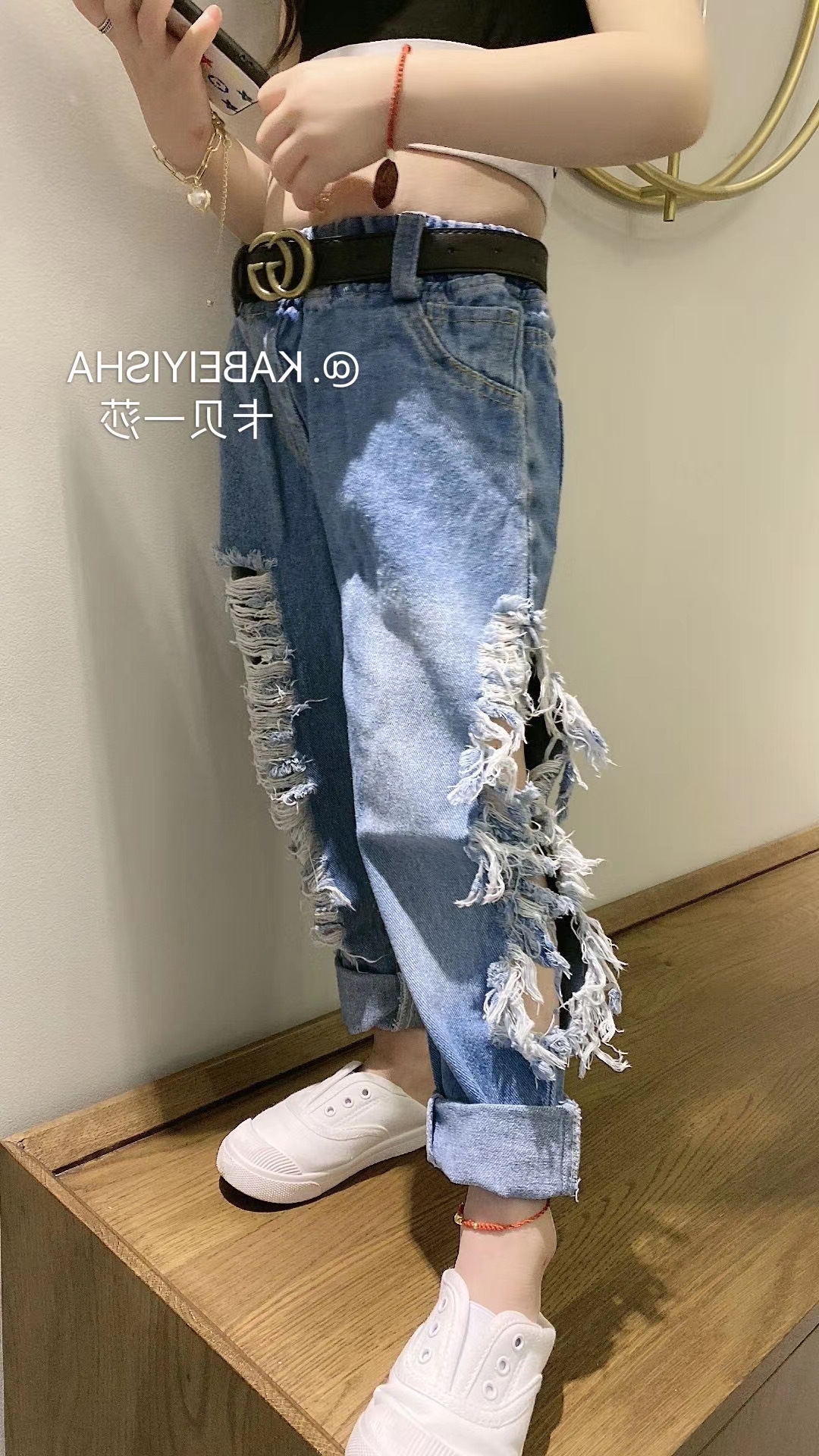 Детские джинсы с разрезами по бокам оптом из Китая