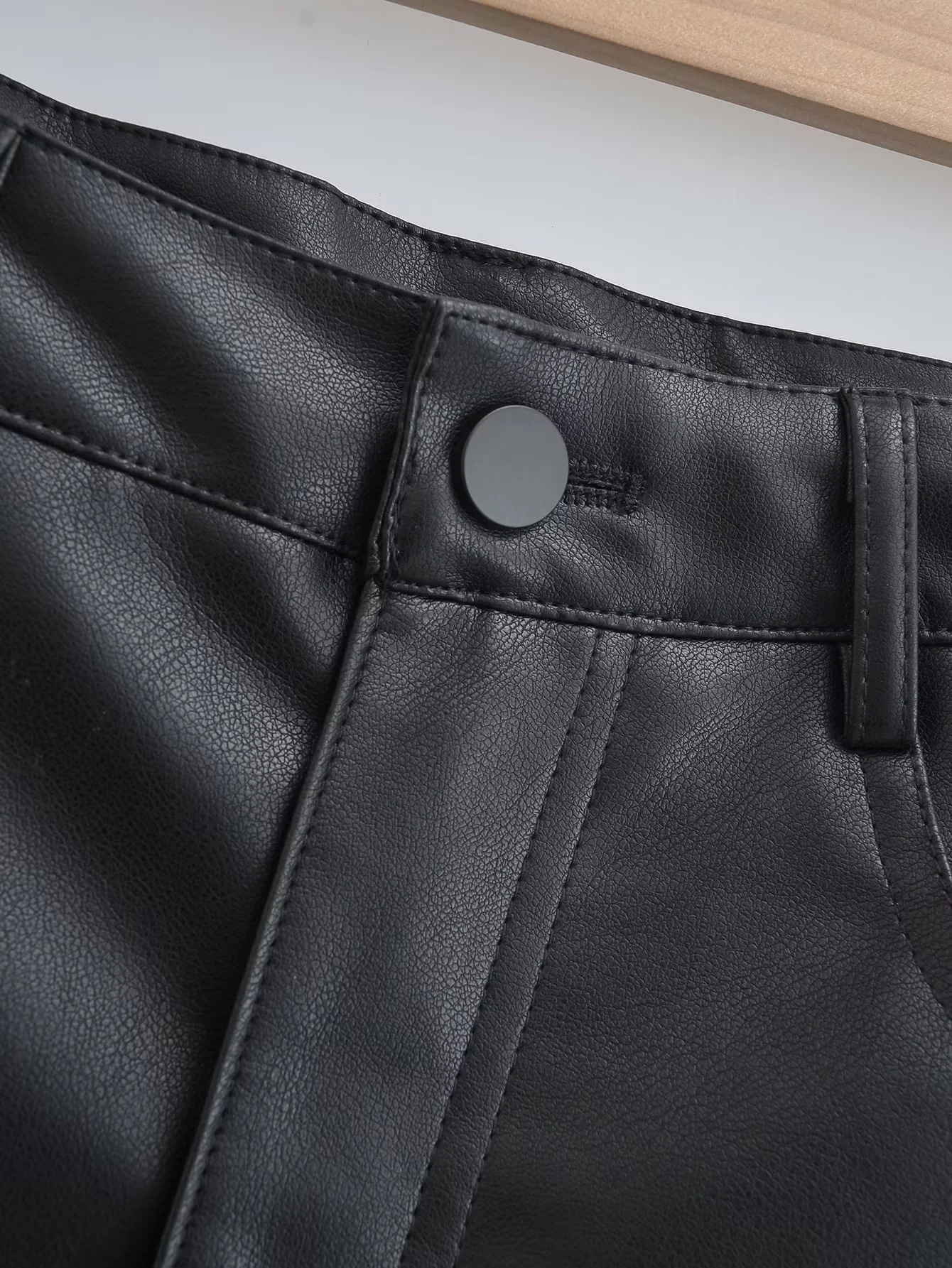 Женская юбка из PU-кожи 2023 нового дизайна высокой посадки оптом из Китая