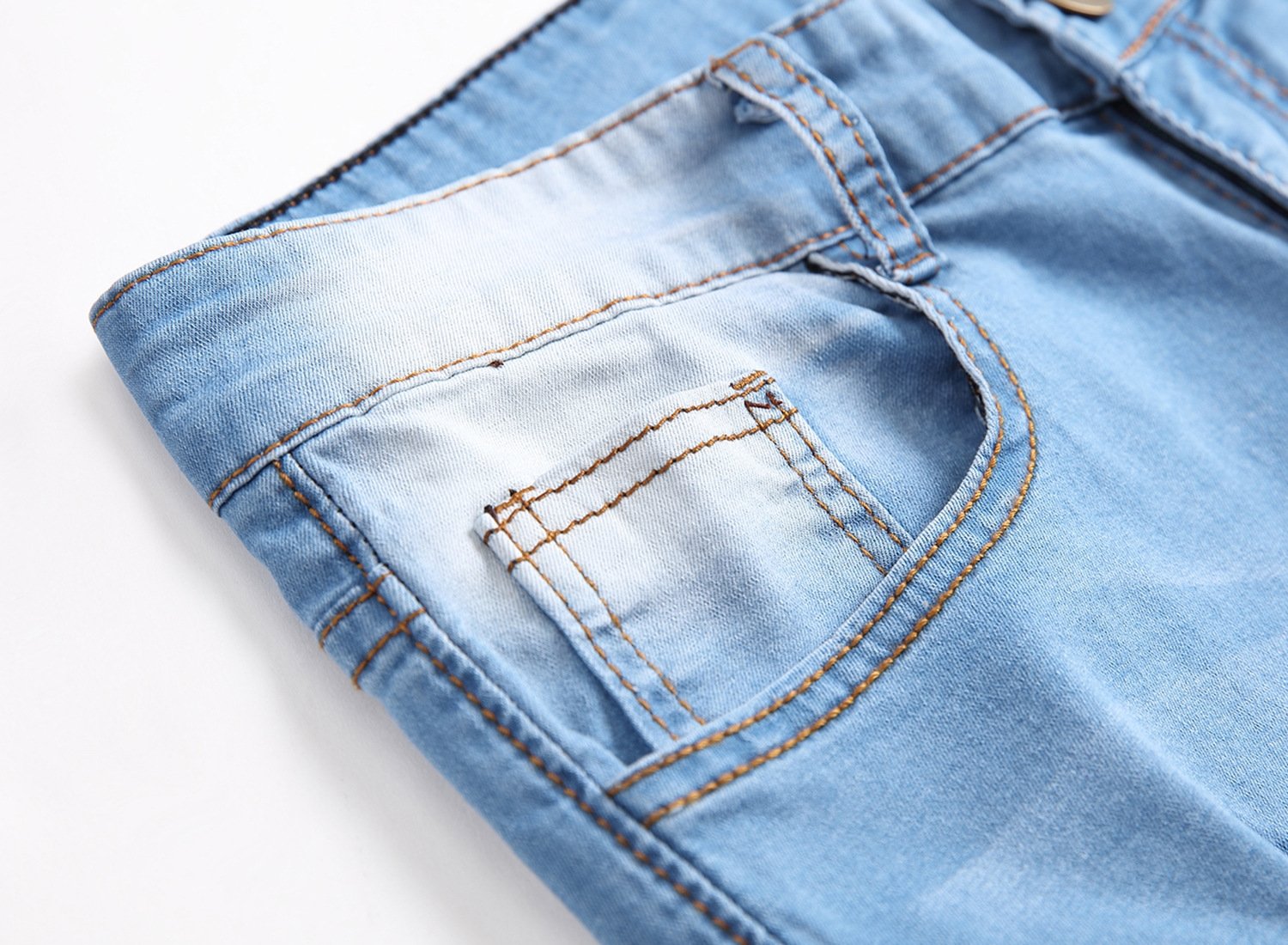 Мужские джинсы с разрывами и зауженными штанинами оптом из Китая