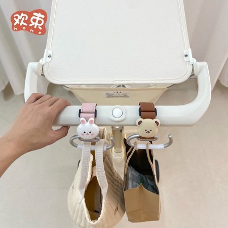 Крючок для коляски фотография