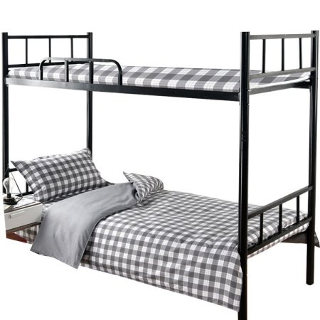 Одеяло для спальни в университетском общежитии фотография