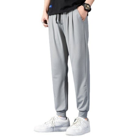 Мужские спортивные брюки с манжетами и эластичным поясом фотография