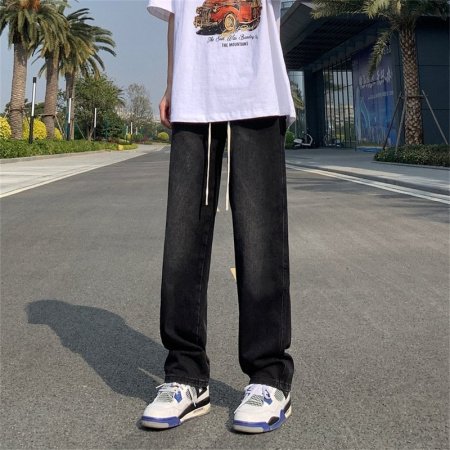 Джинсы с прямым кроем и потертостями фото