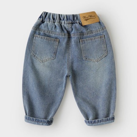 Джинсы для мальчиков с прорезями весенней моды фотография