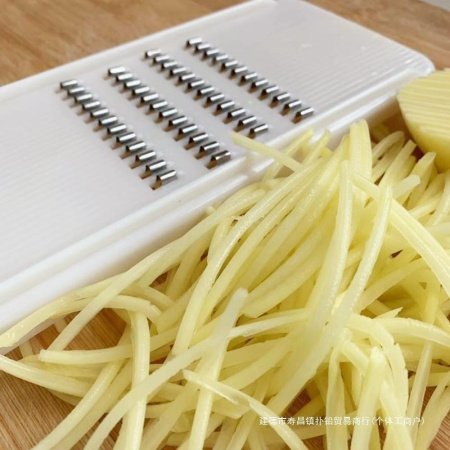 Нож для нарезки овощей фотография