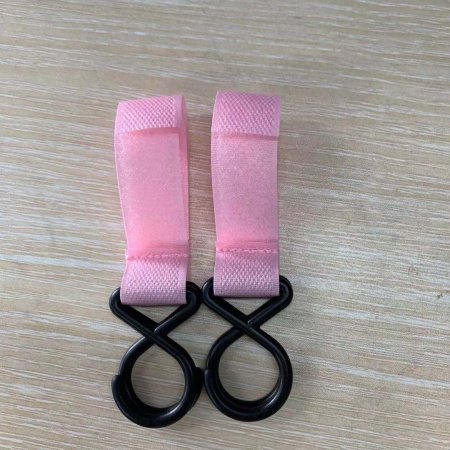 Мультифункциональный крючок для детской коляски фотография