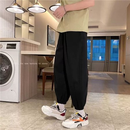 Широкие мужские брюки с завышенной талией фотография