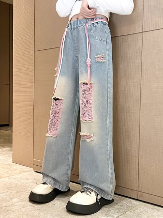 Джинсы для девочек 2023 весна и осень новые детские брюки корейской моды для девочек с дырками широкие брюки фотография