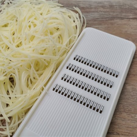 Ручной резак для нарезки овощей изображение