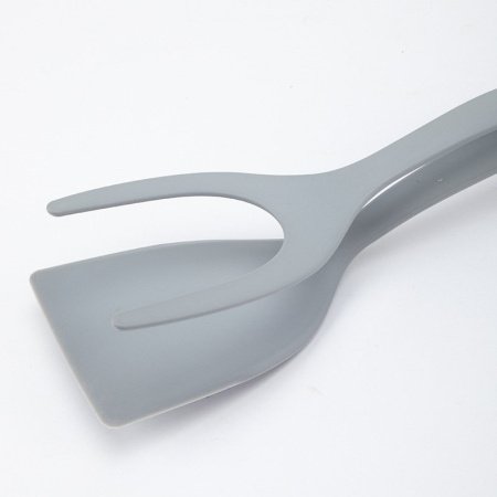 Нейлоновая лопатка для жареного мяса фотография