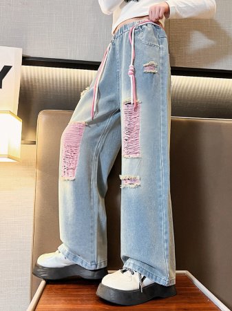 Джинсы для девочек 2023 весна и осень новые детские брюки корейской моды для девочек с дырками широкие брюки фотография