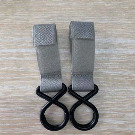 Мультифункциональный крючок для детской коляски фотография