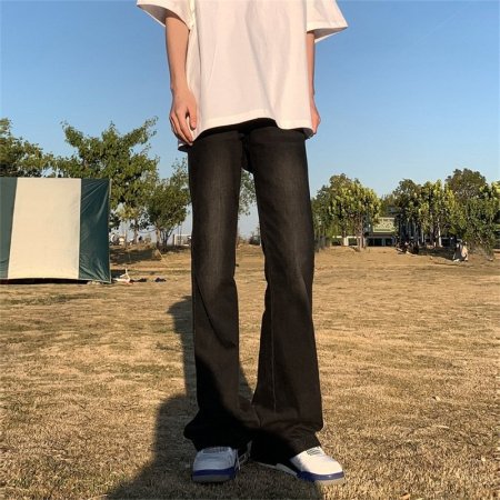 Джинсы с прямым кроем и потертостями фото