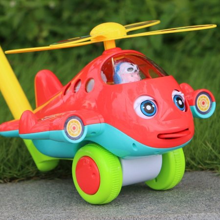 Детская игрушка-погремушка с ручкой и колокольчиком фотография