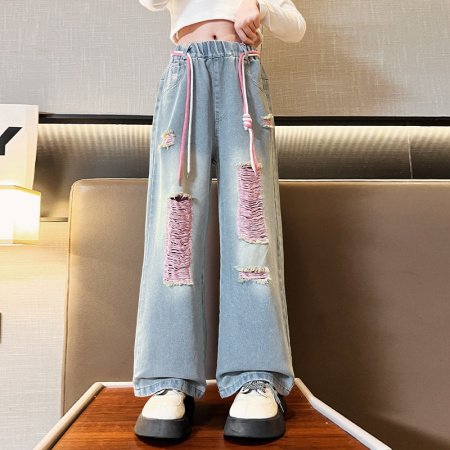 Джинсы для девочек 2023 весна и осень новые детские брюки корейской моды для девочек с дырками широкие брюки фотография