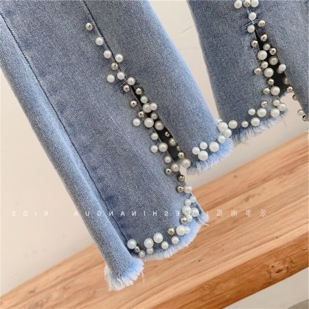 Детские джинсы с жемчугом и кружевами фотография