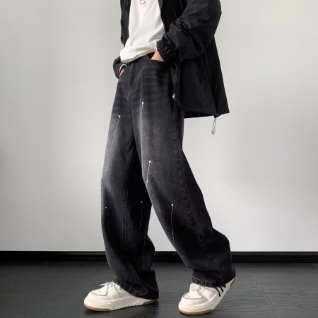 Мужские джинсы с пятнами чернил фотография