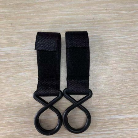 Мультифункциональный крючок для детской коляски фотография