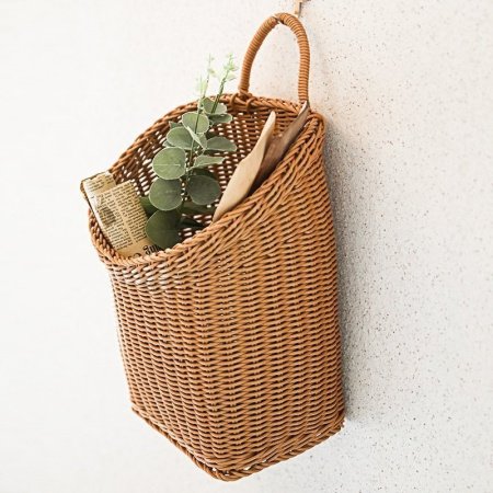 Плетеная корзина для хранения фотография