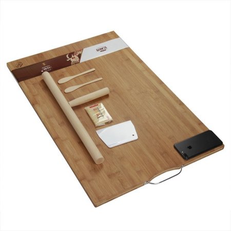 Бамбуковая разделочная доска фотография