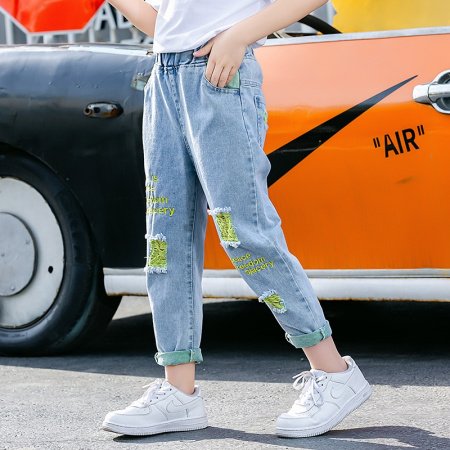 Летние джинсы для девочек с вышивкой и дырками фотография