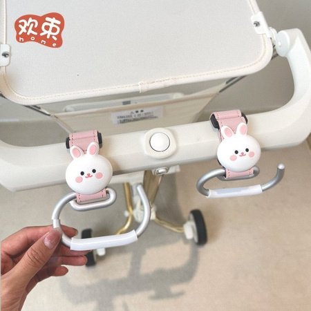 Крючок для коляски фотография