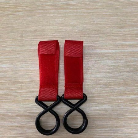 Мультифункциональный крючок для детской коляски фотография