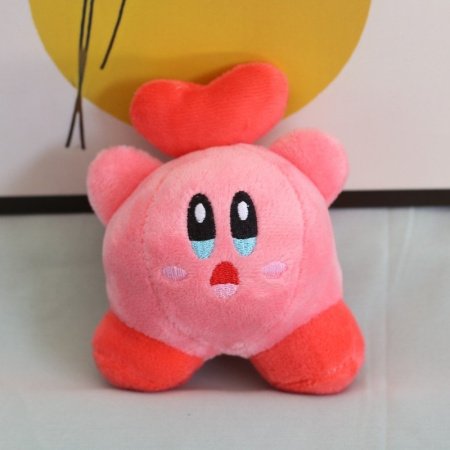 Мягкая игрушка Кирби с различными аксессуарами изображение