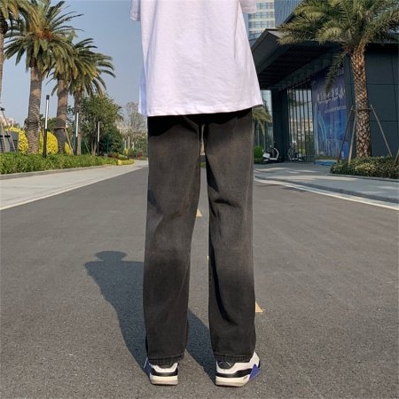 Джинсы с прямым кроем и потертостями фото