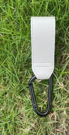 Крючок для детской коляски фотография