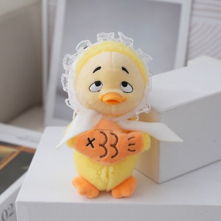 Мягкая игрушка утка фотография