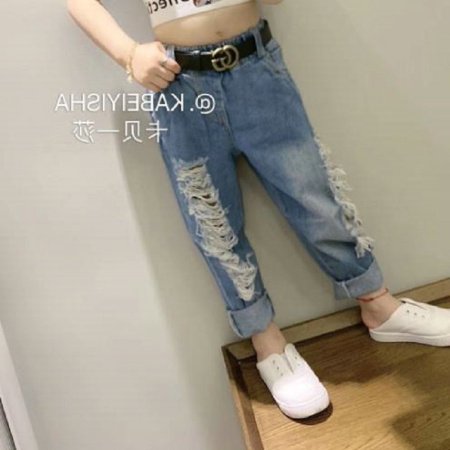 Детские джинсы с разрезами по бокам фотография